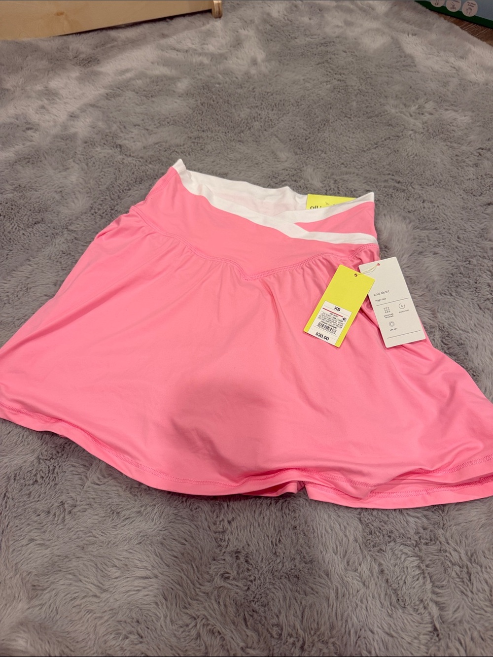 Women’s high rise pink skort with white trim - all in motion